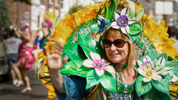 A woman in floral fancy dress